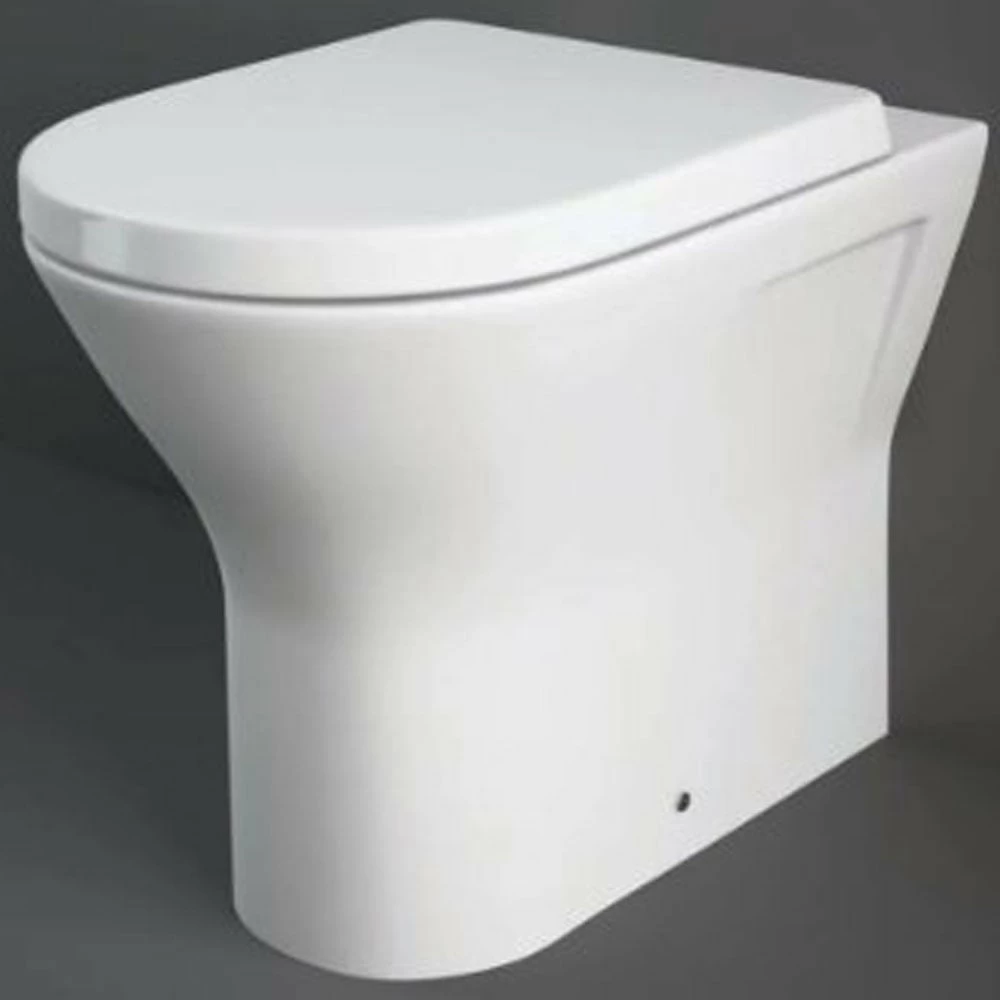 RAK Resort Alpine White Back To Wall Rimless Toilet Pan & Seat - RSTBTWPAN/SC 1 RAK Resort Alpine White Back To Wall Rimless Toilet Pan & Seat - RSTBTWPAN/SC